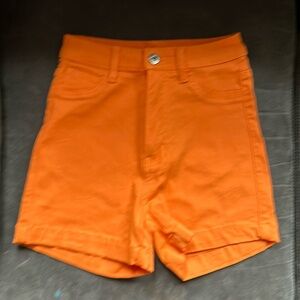 Orange denim shorts